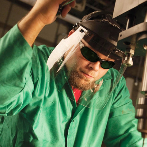 Close-up of worker using Hellraiser V40 Safety Glasses Featuring IRUV Shade 5.0 Lenses and a durable black frame.