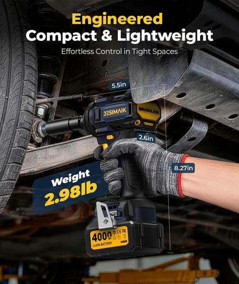 Mechanic using Cordless Impact Wrench With 1200 Newton Meters Breakaway Torque Half Inch Drive Brushless 21 Volt Power Tool under vehicle.