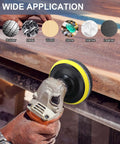 Using All In One 261 Piece 3 Inch Sanding Discs Kit on wood surface, highlighting multiple applications for metal, stone, and rubber.
