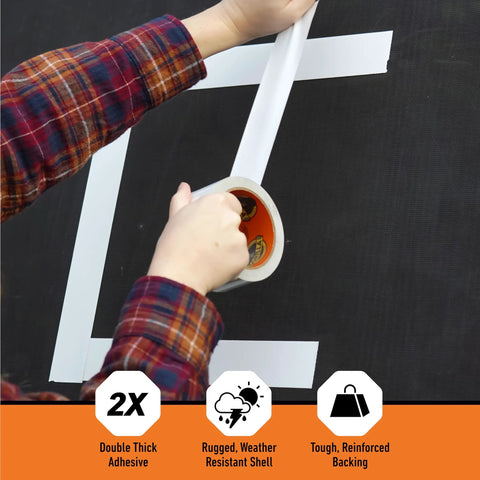 Person applying Beast Tough Heavy Duty White Duct Tape 1.88 Inch Wide By 10 Yards Long Pack Of 6 on black surface.