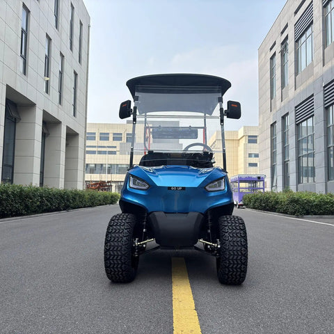 2 Seater Electric Golf Cart 2026 Model Built Different With Adjustable High Back Seats Foldable Rear Bench Smooth Operator Handles 400 Pound Loads Includes Cup Holders Usb Charger Basket And Digital Dashboard front view on road.
