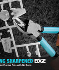 Six Inch Pro Grade Wire Cutters With CNC Machined Edges cutting plastic model parts on gray background