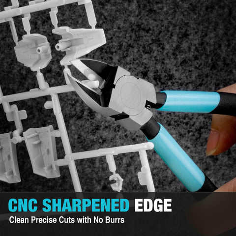 Six Inch Pro Grade Wire Cutters With CNC Machined Edges cutting plastic model parts on gray background