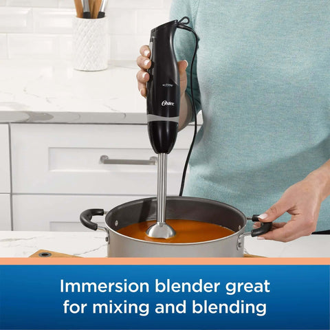 Top Shelf Kitchen Workhorse Featuring Durable Immersion Hand Blender Matched With Razor Sharp Electric Knife Alongside Agile 2 Cup Mini Food Vegetable Chopper For Dinner Domination In Versatile Black Package, immersion blender in black mixing soup.
