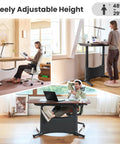 Colamy 55x28 Inch Electric Standing Desk Dual Motor Sit Stand Workstation with adjustable height 48 to 29 inches in use.