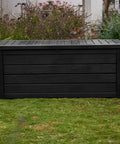 Beefy Westwood 150 Gallon Resin Outdoor Storage Box for Patio in garden setting, dark grey, lockable