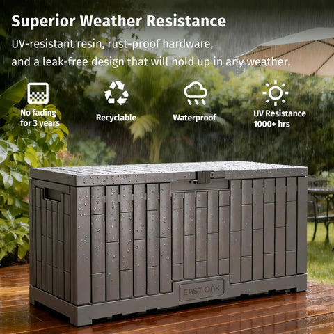 120 Gallon Outdoor Storage Box For Patio And Backyard Heavy Duty Resin Deck Box in rain showcasing weather resistance features