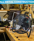 12-Inch Cradle Floor Fan With 3-Speed High-Velocity Airflow, 180-Degree Tilt, All-Metal Build on workshop table