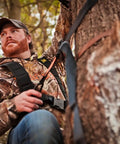 Hunter using LCS Lineman's Climbing Strap for Tree Stand Safety and Quick-Adjust Fit, Heavy-Duty Hunting Gear in action outdoors