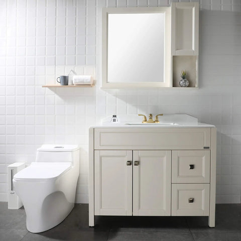 Two-Handle Bathroom Sink Faucet in Brushed Gold with Metal Push and Seal Pop-Up Drain in modern white bathroom setting.