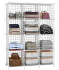 Wire Cube Storage Organizer With 12 Metal Cubes Bookshelf And Closet Storage Unit Portable Shelving For Bedroom Home Office Easy Assembly White Great For Books Toys Clothes Shoes And More In Any Room filled with folded clothes, handbags, and storage boxes