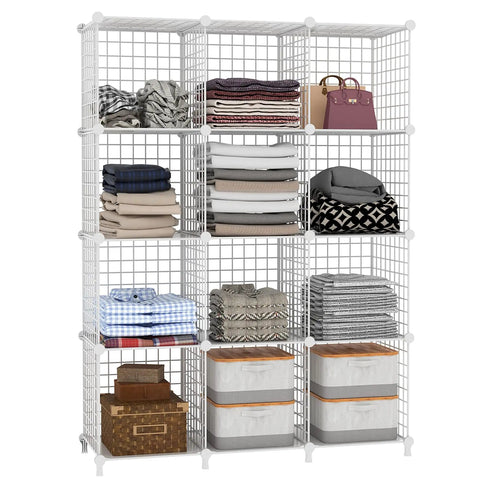 Wire Cube Storage Organizer With 12 Metal Cubes Bookshelf And Closet Storage Unit Portable Shelving For Bedroom Home Office Easy Assembly White Great For Books Toys Clothes Shoes And More In Any Room filled with folded clothes, handbags, and storage boxes