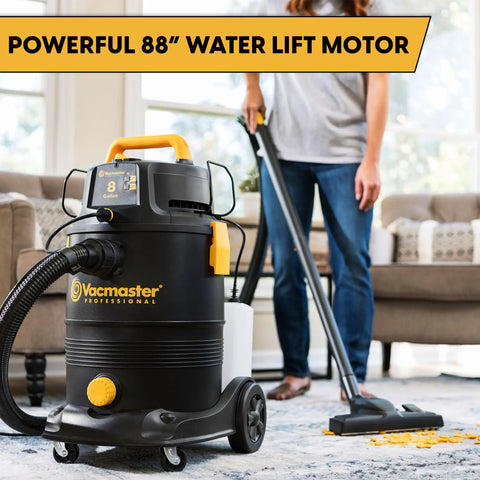Person using Beast Mode 8 Gallon Wet Dry Vacuum With External Detergent Tank And Remote Control on carpet at home