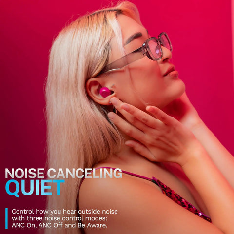 Woman wearing Go Pop ANC True Wireless Earbuds With Charging Case In Fuchsia, Active Noise Cancelling, with pink background.