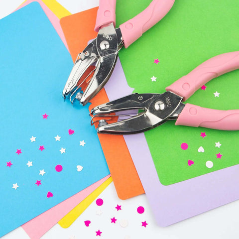 Star Shaped Handheld Paper Hole Punch With Soft Grip Pink Silicone Cover for Scrapbooks on colorful paper with confetti stars
