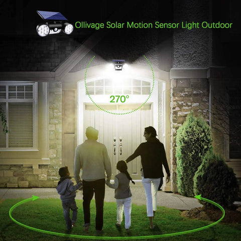 Outdoor Solar Security Lights 30 LED Dual Head Motion Sensor Floodlights illuminating front door at night.