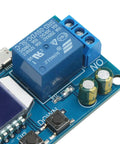 Close-up of a blue Time Delay Timer Relay with LCD Display for 5V 12V 24V systems, showing micro USB port and relay components.