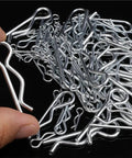 Close-up of R Clip Wave Style Cotter Pin Set 200 300 Pieces Steel Spring Split Clips spread on a black surface