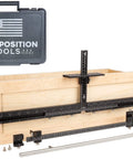 Cabinet Hardware Jig For Long Pulls And Shelf Pin Holes Install 32mm Holes On Shaker Doors And Recessed Fronts Made In USA Hand Calibrated By True Position Tools Ultra Versatile DIY Friendly Pro Grade Kitchen Cabinetry Tool displayed with a wooden drawer front and carrying case.