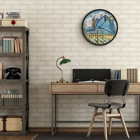 Dead Quiet Sweep Wall Clock With A Sweet Rural Blue Valley Warehouse Vibe Non Ticking Round Timepiece Battery Operated Design displayed in a chic home office.