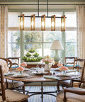 Farmhouse Gold Solid Wood Five Light Chandelier With Black Metal Frame above dining table in well-lit room