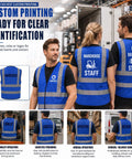 Heavy Duty High Visibility Safety Vest In Vivid Blue Featuring Continuous Reflective Banding Cut From Ultra Breathable Mesh For Hard Hats Trail Blazers And Night Runners Straight Up Designed To Keep You Seen And Locked In on logistics workers in a warehouse.