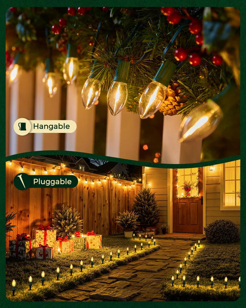 Outdoor Christmas Pathway Lights 2 Pack, 51.4 Ft Total, 40 Bulbs, Waterproof Walkway Lights for Yard, Garden, Driveway and Sidewalk, Connectable, 7W Per Bulb, 15 Inch Spacing, E17 Base, Clear installed on a garden pathway and hanging from a fence.
