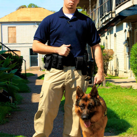 Officer with German Shepherd wearing Police Security Modular Duty Belt Loadout with Colt 1911 holster and pouches