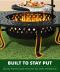 43 Inch Outdoor Wood Burning Fire Pit With Lid And Two Grill Grates Metal Round Table with burning fire and grilled food