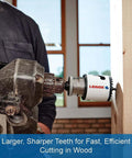 Side view of Lenox 3-1/8 in bi-metal hole saw with speed-slot arbor attached to a drill, cutting wood.
