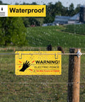 Electric Fence Warning Signs Set Of 10, 9.6 By 5 Inches, Durable Plastic For Farm And Home, Easy Mount With 5 Holes, Weatherproof Signage That Sticks Firmly To Keep Livestock And Property Safe. Waterproof yellow electric fence warning sign on post in rain.