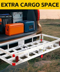 Aluminum Cargo Carrier with High Side Rails for 2 Inch Hitch Receiver attached to SUV with storage boxes, grass background.