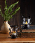 Flameless Flickering Tealights In Pearl Ivory Set Of 4 Realistic LED Flame Battery Operated Votive Candles in black holders