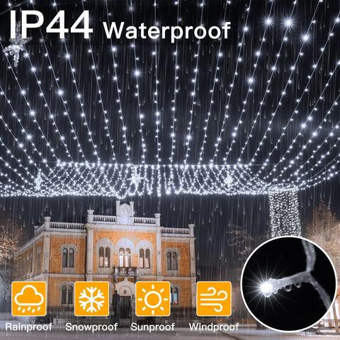 Outdoor 800 LED Christmas String Lights 262 Feet With Remote 8 Modes Dimmable Waterproof Timers over building at night
