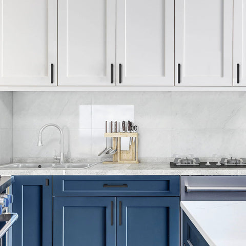 Modern kitchen with Matte Black Cabinet Knobs Set 10 Pack Durable Zinc Alloy Single Hole Cabinet Handles on white and blue cabinets