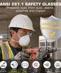 Kickass Clear Safety Glasses Built Solid With Antifog Lenses And Comfortable Fit For Hardworking Crews And Daily Grind Bulk Pack Ansi Certified Protective Eyewear For The Job Site Hustle worn by a worker drilling in a construction site.