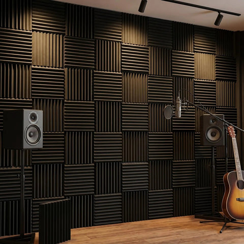 96 Pack Heavy Duty Acoustic Foam Wedge Tiles Soundproofing Wall Panels For Recording Studios mounted on a studio wall with speakers.