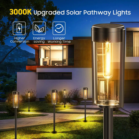 Solar Pathway Lights Outdoor 6 Pack Upgraded Super Bright LED With Auto On Off IP65 Waterproof Landscape Walkway Driveway Patio Yard Lighting Long Lasting Up To 12 Hours Weatherproof Garden Lighting illuminating a modern home pathway.