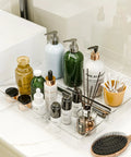 Clear Plastic Drawer Organizer Set For Kitchen Bathroom Office Cosmetics And Tools With Adjustable Dividers Space Saving Transparent Design 9 Pieces featuring bottles and toiletries on bathroom counter