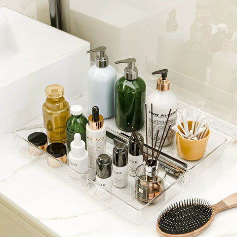 Clear Plastic Drawer Organizer Set For Kitchen Bathroom Office Cosmetics And Tools With Adjustable Dividers Space Saving Transparent Design 9 Pieces featuring bottles and toiletries on bathroom counter