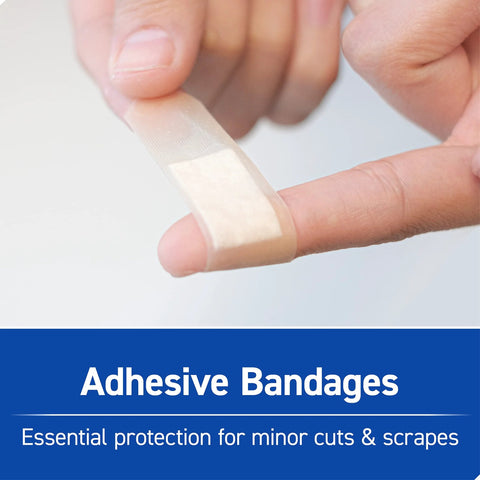 Adhesive bandage on fingertip; beige, close-up view.