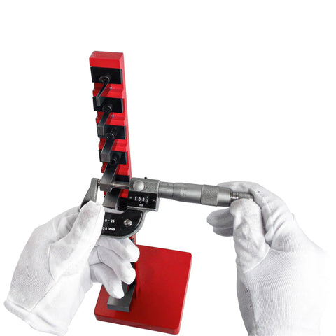 36 Piece Rectangular Gage Block Set, Steel Grade Economy for Workshop Calibration and Inspection, High Precision With Plus Or Minus 0.000050 Inch Tolerance, Includes 0.050 To 4.000 Inch Ranges For Easy, Reliable Measurements. Micrometer checking gage block stack in gloved hands.