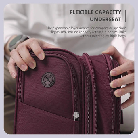 Close-up of underseat carry on luggage with USB port, 16 inch two wheel spinner bag, showing easy glide zipper and expandable capacity.
