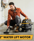 User operating Heavy Duty 5 Gallon Wet And Dry Shop Vac With Beast Series Motor on wet surface with cleaning nozzle.