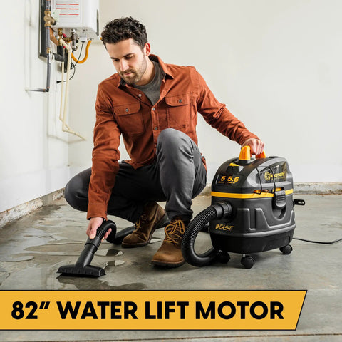 User operating Heavy Duty 5 Gallon Wet And Dry Shop Vac With Beast Series Motor on wet surface with cleaning nozzle.