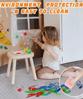 Child painting on wall with Thick Office Chair Mat For Carpeted Floors 48 By 30 Desk Mat With Easy Glide under table