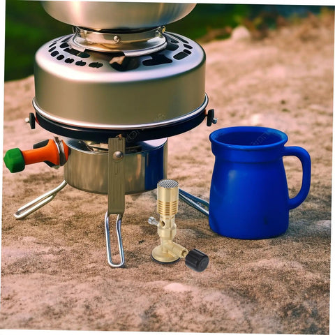 Portable Gas Blowtorch Head For Camping And Outdoor Cooking with Brass Construction next to stove and blue mug