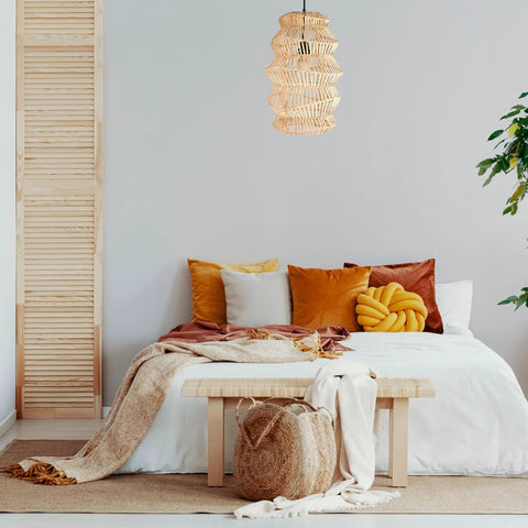 FOREVER BAMBOO Handwoven Indonesian Bamboo Pendant Light, 18 in H x 12 in W hanging over a cozy, minimalist bedroom setting.