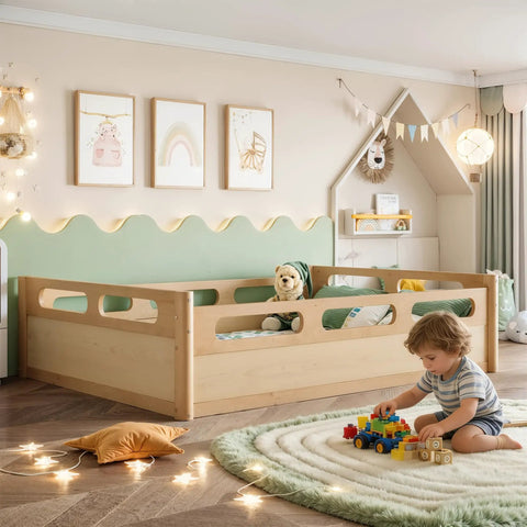Toddler room with full size floor platform bed for toddlers with full length guardrails on three sides. Low profile natural wood finish.
