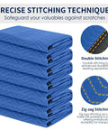 Stack of Ultra Large 80 By 72 Inch Moving Blankets 12 Pack Beefy Heavy Duty Furniture Pads, blue with precise double and zig-zag stitching.